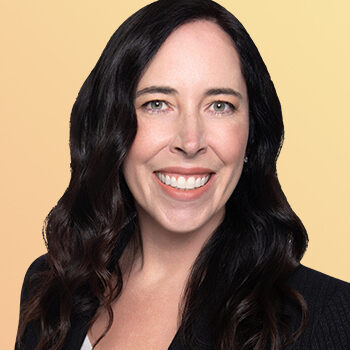 Emily Newton-Headshot-Color Background